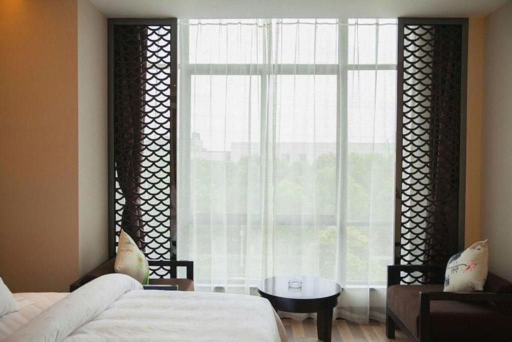 Jinjiang Metropolo Hotel - Liyang Tianmu Lake Changzhou  Bagian luar foto